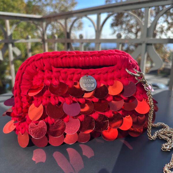 Crpchet red sequin clutch with Sicilian print lining and a detachable strap